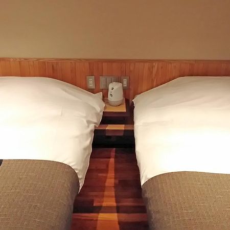 Niseko Konbu Onsen Tsuruga Moku-No-Sho Hotel Quarto foto