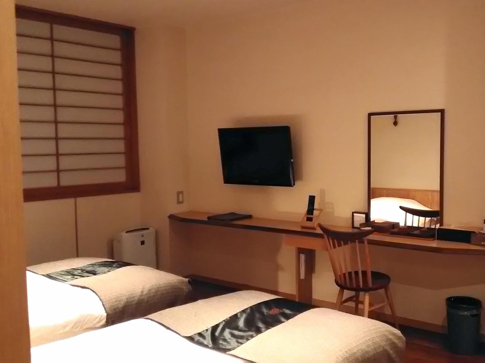 Niseko Konbu Onsen Tsuruga Moku-No-Sho Hotel Quarto foto